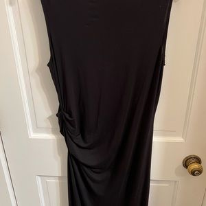 Calvin Klein black size small, ruched on left side.
